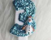 Frozen Olaf glitter birthday number candle baby blue, comes in any number you like