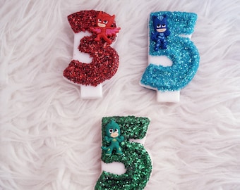 Peter Pan glitter birthday number candle comes in any number you like