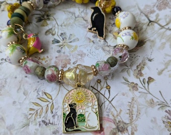 Enameled Cat Charm Bracelet: Czech Glass Beads, Bird Charms, Gold Accents