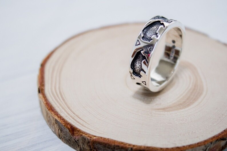 Sterling silver band style ring with stamped Buffalos shadowboxed