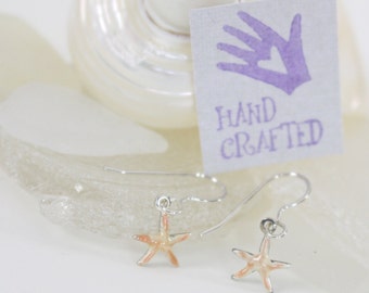 Tiny Sterling silver Starfish dangle drop earrings hand enameled orange and white swirl