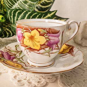 Bell China Teacup with Matching Saucer, Vintage White Porcelain Teacup with Purple and Yellow Flowers Design, Pretty Flowers Teacup Gift