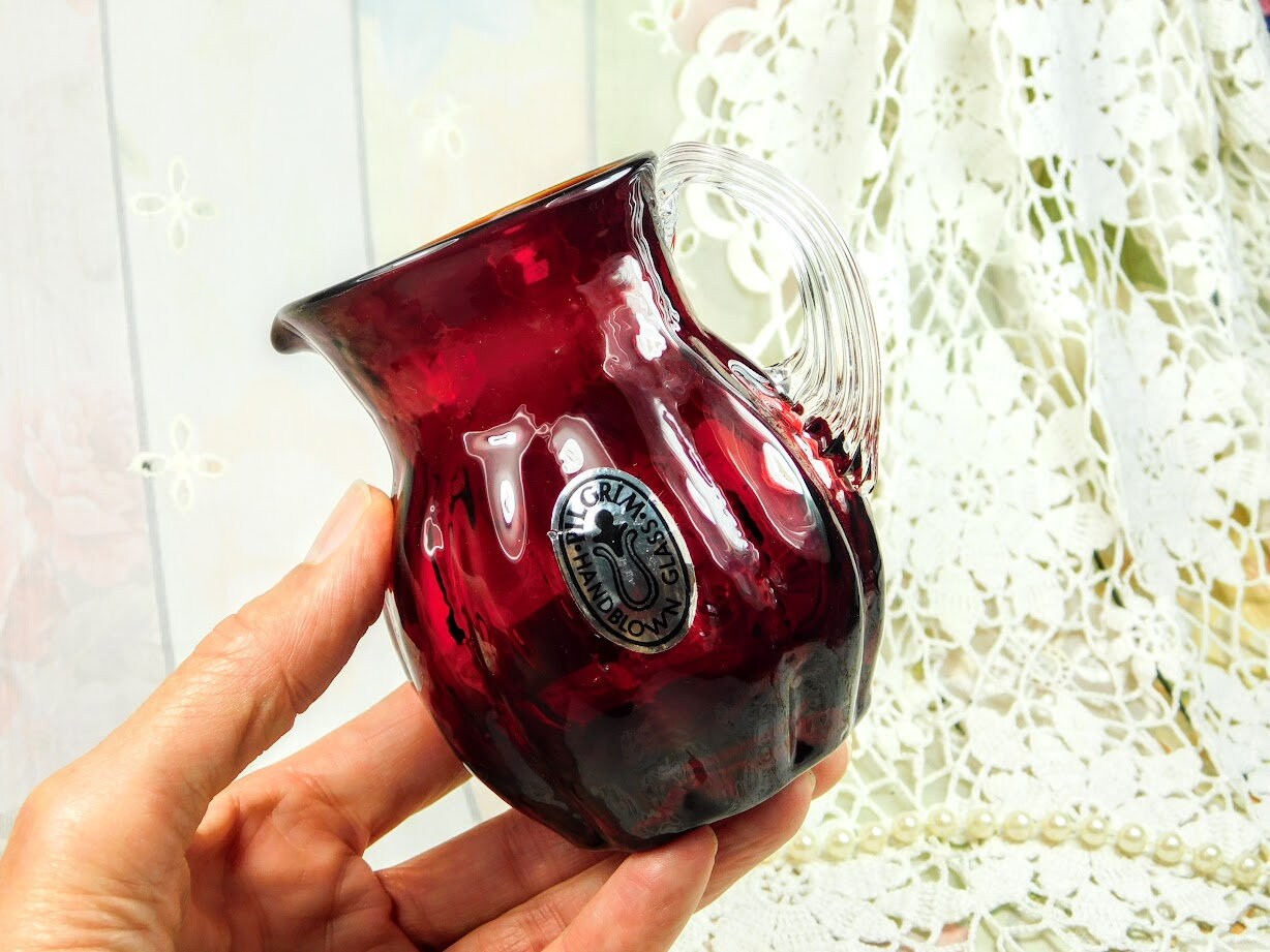 Handblown small glass pitcher