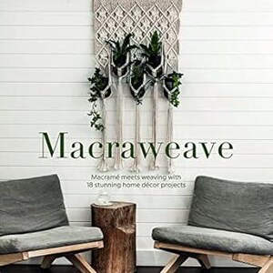 May include: A macramé wall hanging in neutral tones, with hanging planters displaying greenery. The image features the book "Macraweave" with text about macramé and home décor projects. Two grey cushioned chairs and a wooden side table are also visible.