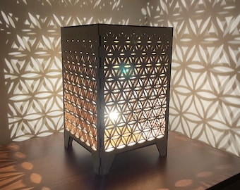 Flower of Life geometric pattern shadow lamp.