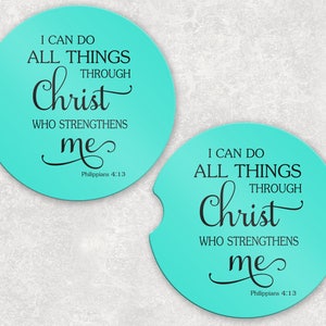 May include: Two turquoise blue round car coasters with the text "I can do all things through Christ who strengthens me" and "Philippians 4:13" in black.