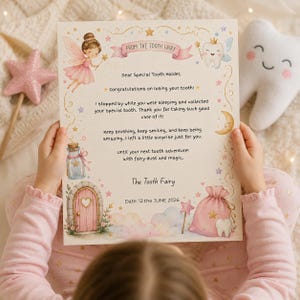 May include: A cream-colored letter from the Tooth Fairy featuring a pink banner, a fairy illustration, a smiling tooth character, a small door, and a pink pouch. The text reads: From the Tooth Fairy, Dear Special Tooth Holder, Congratulations on losing your tooth! I stopped by while you were sleeping and collected your special tooth. Thank you for taking such good care of it! Keep brushing, keep smiling, and keep being amazing. I left a little surprise just for you. Until your next tooth adventure! with fairy dust and magic, The Tooth Fairy, Date: 12 the JUNE 2026.
