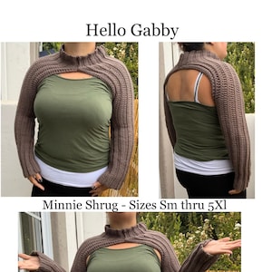 May include: A brown crocheted shrug with a high neck and long sleeves. The shrug has a cutout in the back and is shown being worn over a green tank top.