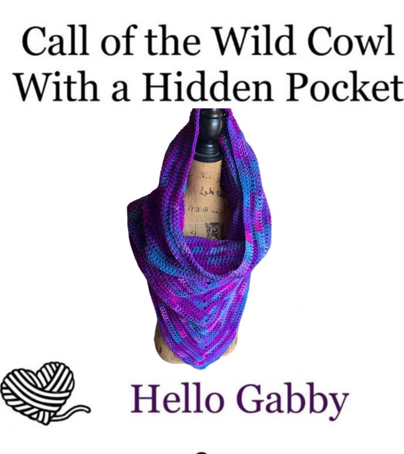 May include: A purple and blue crocheted cowl with a hidden pocket. The cowl is displayed on a wooden mannequin. The text "Call of the Wild Cowl With a Hidden Pocket" and "Hello Gabby" are visible in the image.