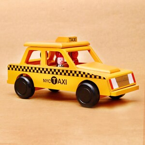 Mr. Ellie Pooh Handmade Wooden Taxi with Driver and Passengers