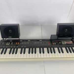 Casio Casiotone MT-800 Vintage 49 key Keyboard Synthesizer Speakers 6 ROM packs & Manuals