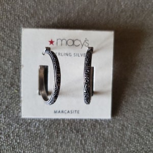 Dazzling diamond naire black on sale paparazzi