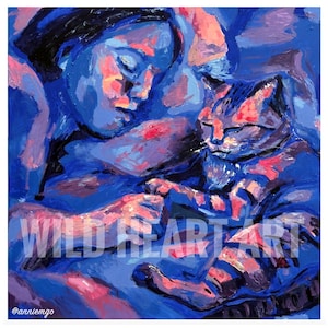 May include: An abstract painting in shades of blue, pink, and purple depicts a person and a cat in a close embrace. The artwork features the text "WILD HEART ART" and the artist's Instagram handle. The painting style is expressive with visible brushstrokes.