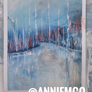 May include: Abstract art print featuring a winter landscape in shades of blue, white, and red. The artwork depicts a path through a forest with vertical tree trunks and the text "I set a little warm in my heart when I think of WINTER" and the artist's name.