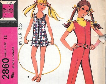 May include: A vintage sewing pattern for a girls' jumpsuit. The pattern shows two girls wearing the jumpsuit, one in a red jumpsuit with stars and the other in a blue and white jumpsuit with stars. The pattern is labeled "McCall's 2860" and "Girls' Jumpsuit".
