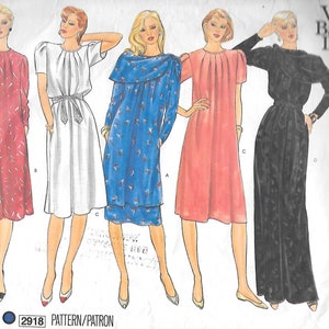 May include: A sewing pattern for four different dresses. The dresses are in red, white, blue, and black. The pattern number is 2918. Vogue's Basic Design.