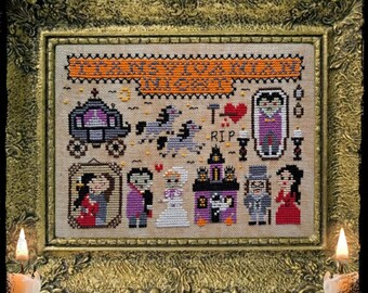 May include: Cross-stitch pattern featuring a spooky wedding scene with a vampire groom, a bride in a white dress, a hearse, a haunted house, and the text "It's a Spooky Wedding!"