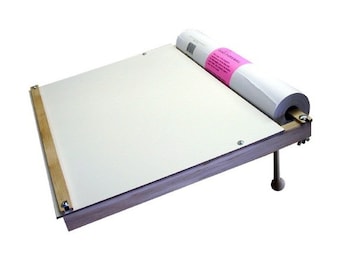 May include: A wooden drawing board with a roll of paper attached to the side. The board is angled and has a wooden guide rail on the left side. The paper roll is labeled "Fast Draw!"