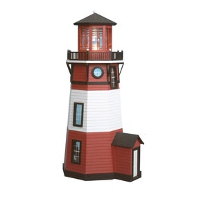 May include: A red and white lighthouse model with a black roof and windows. The lighthouse has a small, attached building with a door.