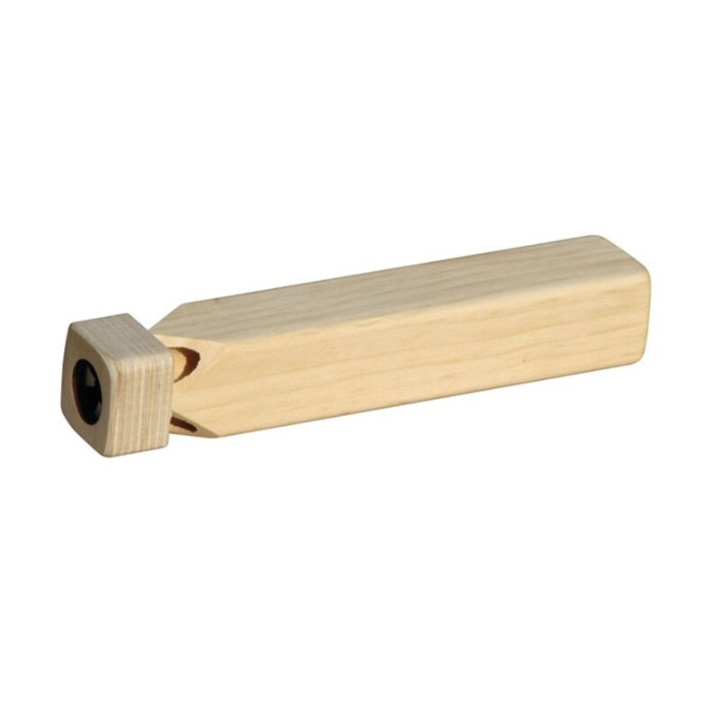 May include: A wooden whistle with a square mouthpiece and a rectangular body. The whistle is made of light brown wood.