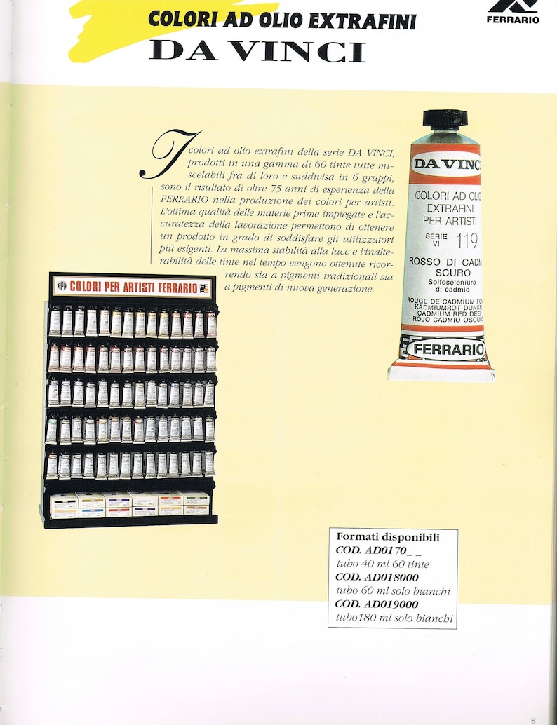 May include: A close-up of a tube of Da Vinci oil paint in the color Rosso di Cadmio Scuro (Dark Cadmium Red). The tube is labeled with the brand name Ferrario and the series number VI 119. The text "Colori ad Olio Extra-fini per Artisti" is also visible on the tube. The tube is sitting on a white background.
