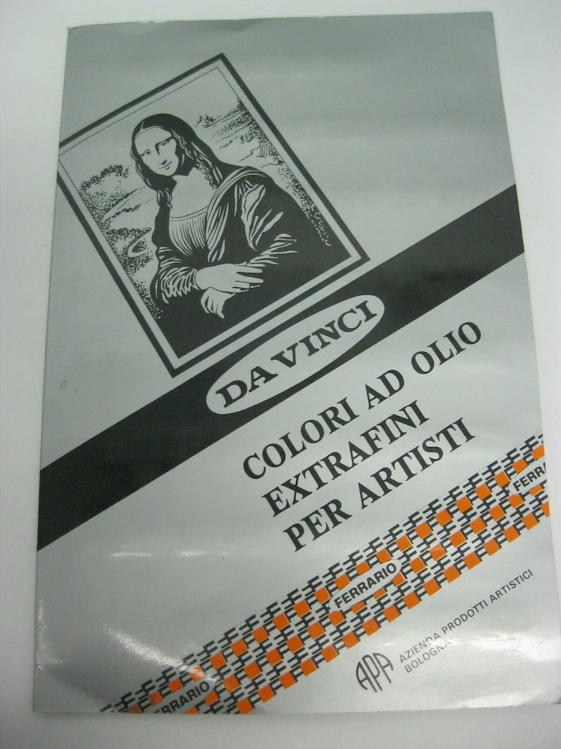 May include: A black and white illustration of the Mona Lisa on a silver background. The text "DAVINCI COLORI AD OLIO EXTRAFINI PER ARTISTI" is printed in black on a white background. The text "FERARIO" is printed in orange on a black background. The text "AZIENDA PRODOTTI ARTISTICI BOLOGNA" is printed in black on a white background.