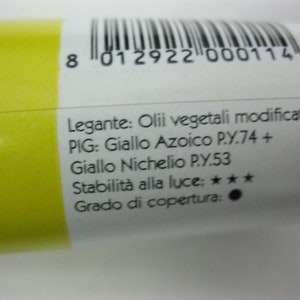 May include: A yellow tube of paint with the text "Legante: Olii vegetali modificati PIG: Giallo Azoico P.Y.74 + Giallo Nichelio P.Y.53 Stabilit&agrave; alla luce: ★★★ Grado di copertura:" printed on the side.