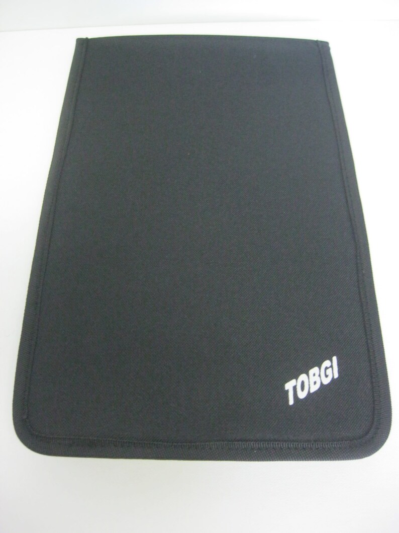 May include: Black laptop sleeve with a white "TOBGI" logo.
