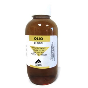 May include: A brown glass bottle of walnut oil with a white label. The label reads "Olio di Noci" and lists the oil's name in several languages. The bottle is made in Italy.
