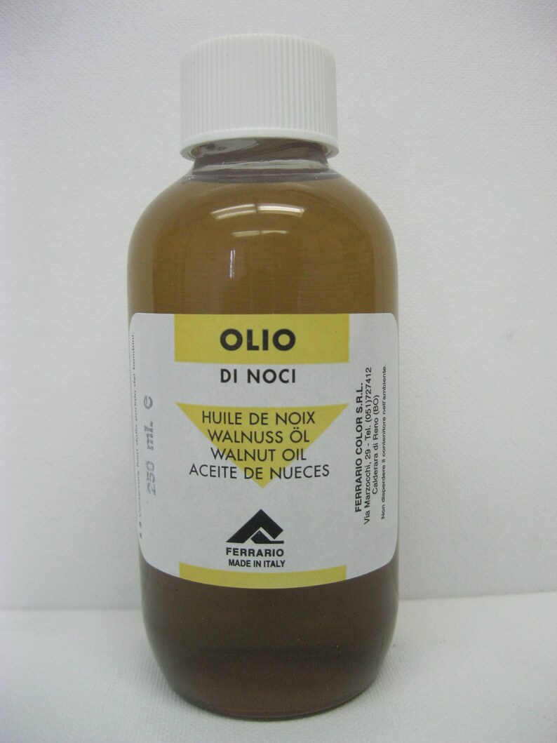 May include: A 250 ml bottle of walnut oil labeled "Olio di Noci" with the brand name "Ferrario Made in Italy".
