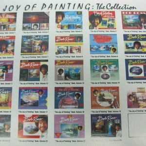 May include: A collection of 24 "The Joy of Painting" books by Bob Ross. Each book features a different painting and a portrait of Bob Ross. The books are arranged in a grid pattern on a white background.