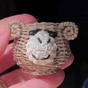 Miniature woven monkey basket