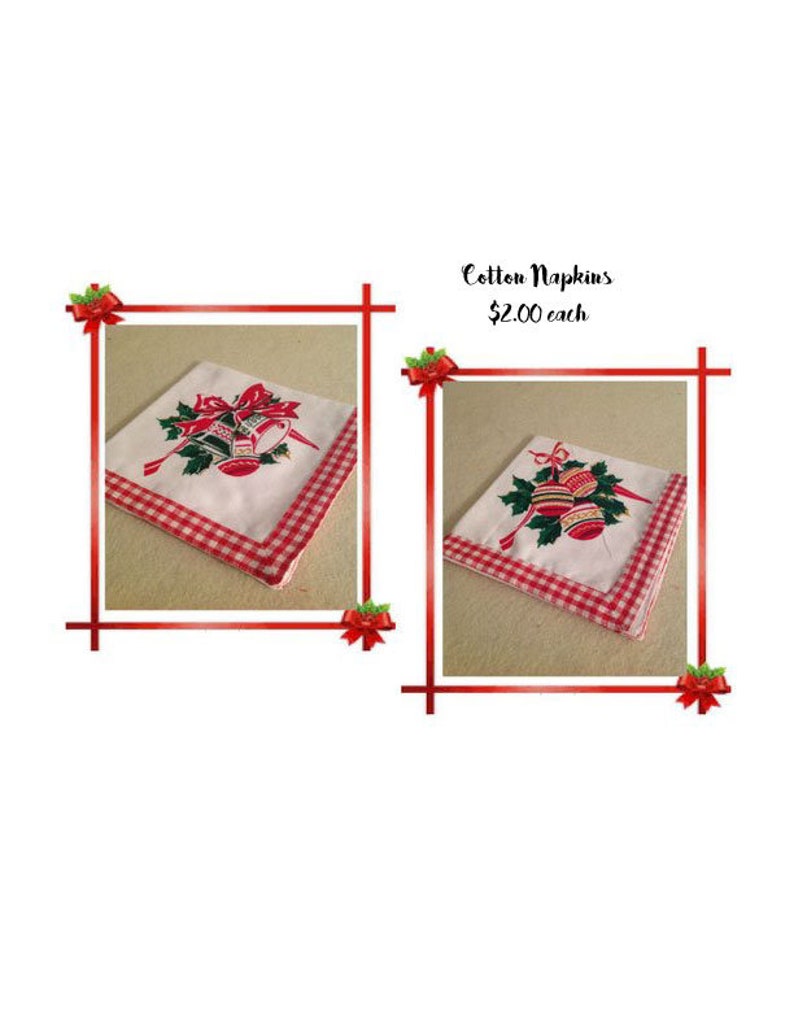 May include: Two white cotton napkins with red and green gingham trim. Each napkin features a Christmas bell design with red and gold accents. The text "Cotton Napkins &pound;2.00 each" is visible in the image.