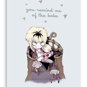 May include: A cartoon illustration of a character with spiky blonde hair holding a baby doll. The character is sitting on a throne with two other dolls sitting on the floor in front of them. The text "you remind me of the babe" is written above the character.