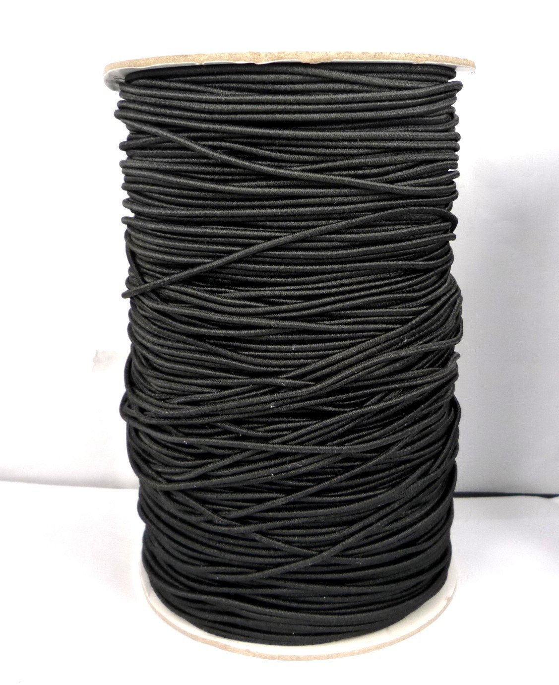 Environ 2mm de largeur - 160 yds/146 mètres - 1 cône noir élastique fil rond élastique cordon corde coudre artisanat ET10 Environ 2mm de largeur - 160 yds/146 yds/146 yds/146 mètres - 1 cône noir élastique fil rond élastique cordon corde coudre artisanat ET10 0bc30e