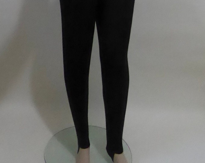 Black stirrup ski pants. White Stag vintage. 1960