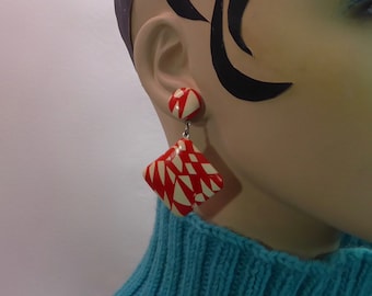 Red and white mobile dangling earrings. Pop art graphic. Op art. Geometric shapes. 60s-70s. Fashionista.