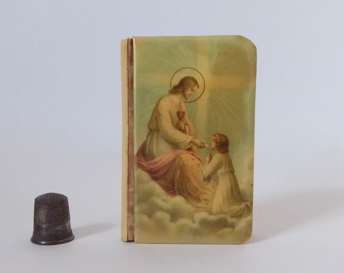 Cute little parishioner with celluloid cover. 1920. First Communion book. Brothers of the Christian Schools. Vintage children's prayer book.