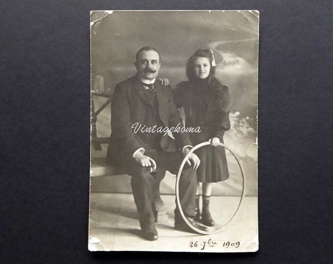 Father and daughter photography. Original black and white postcard. 1909. Handlebar mustache. Hoop girl. Edwardian fashion.