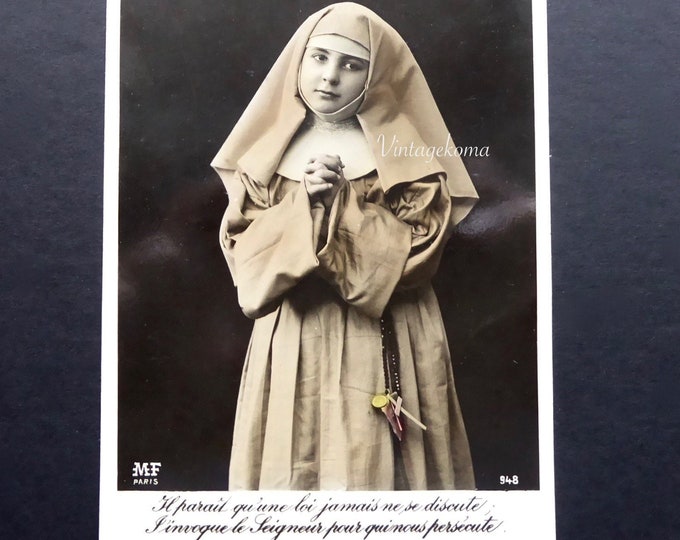 Religious postcard as a child. Nun. Glossy black and white photo. Colored. MF Paris. Cartophilia. 1930. Crucifix. Rosary.