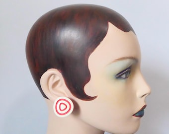 Red-orange, ivory, organic-shaped plastic clip. 1960s. Mid-century earring. Vintage jewelry.