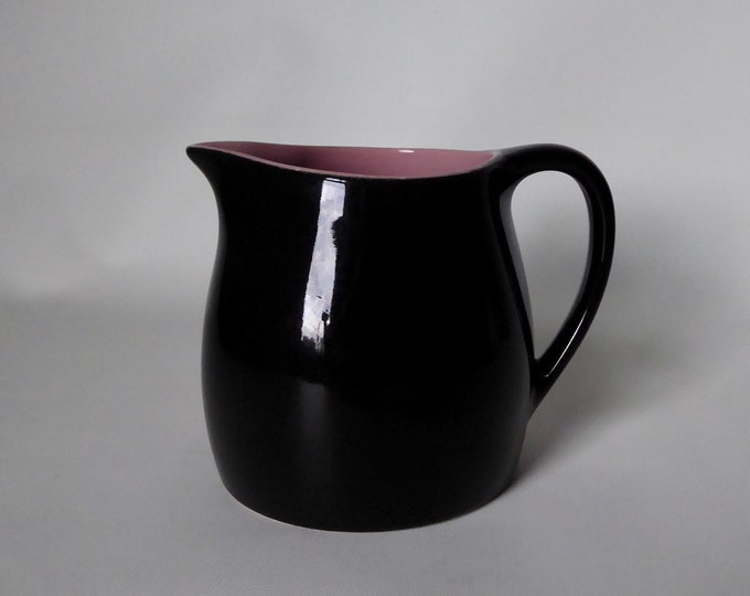 Vintage black and pink ceramic milk jug. Year 50.