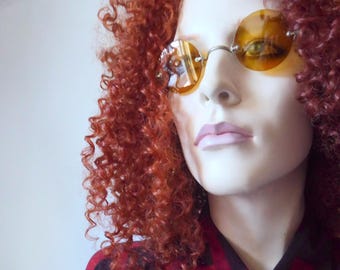 Victorian Taw & Co. round-shaped yellow eyeglasses. Circa 1890.