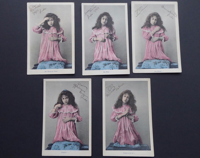 Antique cross sign. Series of 5 postcards Young girl 1913. Edwardian period. Montreal. Catholic rite. Passion of Christ. Pray