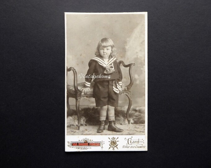 Child photograph 1900. CDV. Sepia. Writing and gold border. Van Damme Frères. Ghent. Photo of young boy long hair sailor suit.