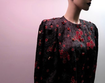 Louis Féraud 1980 Jacket and skirt. Black and red embossed silk. 22 rectangle cabochon jewelry buttons with ruby facets.