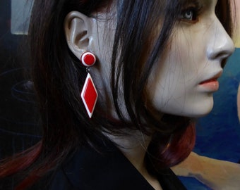 Movable diamond stud earring. Red and white lucite. 1960.
