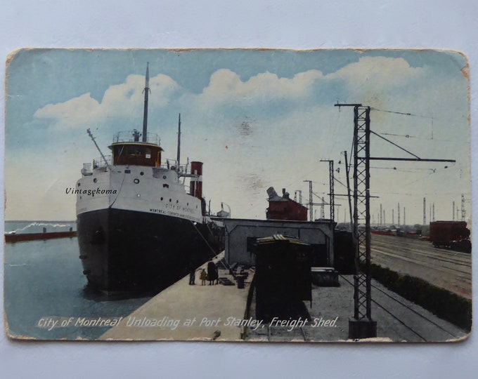 Carte postale Bateau. 1920. Cargo City of Montréal. Déchargement. Port Stanley. Hangar à marchandises. Patrimoine maritime.Patrimoine Canada