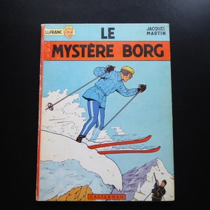 Tintin newspaper. EO 1965. Lefranc. The Borg mystery. Casterman. Winter. Alps. Snow. Vintage skiing. Venice. Sixties comics.