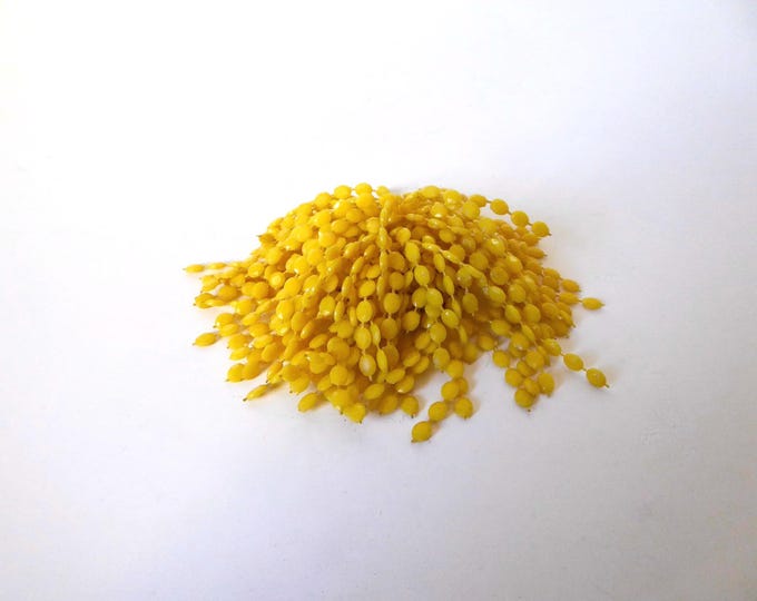 Vintage yellow plastic cascading cluster brooch. 1960s. Sixties jewelry.
